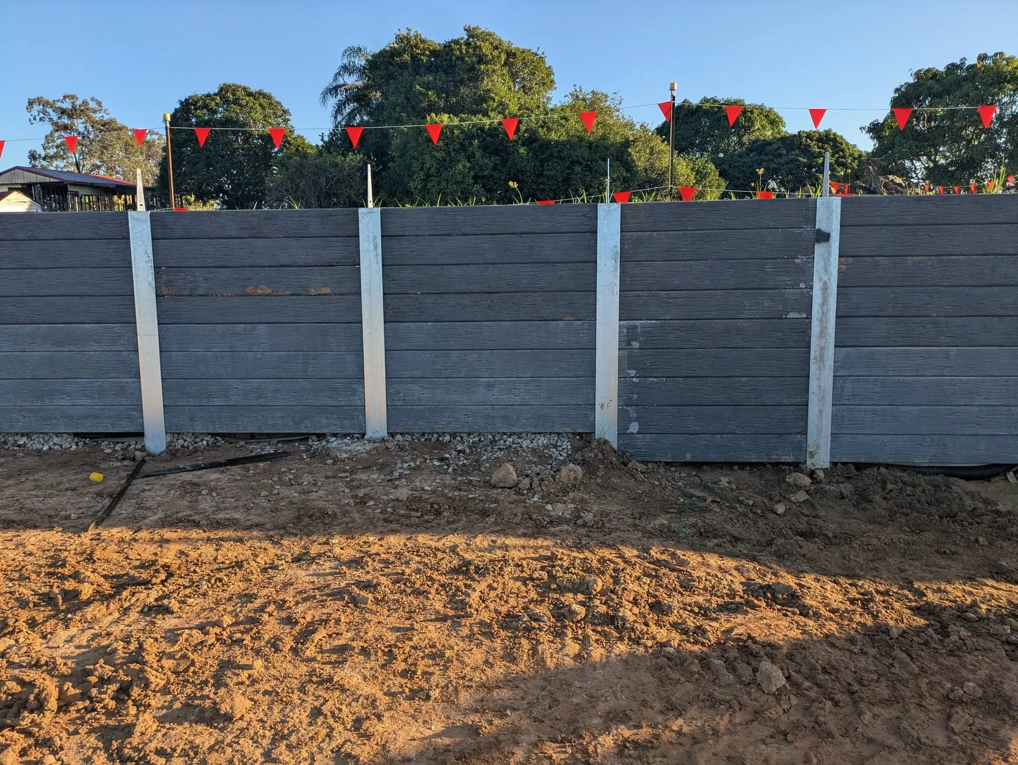 Retaining wall under construction on a commercial site